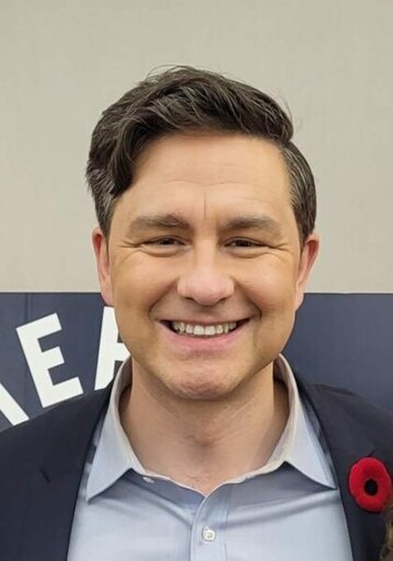 Smiling shitweasel trying to look casual and non-shitweaselly.